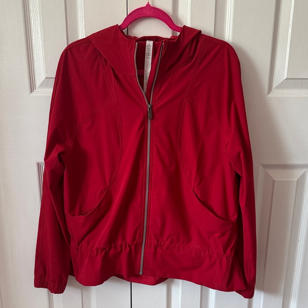 Women’s red Lululemon rain jacket